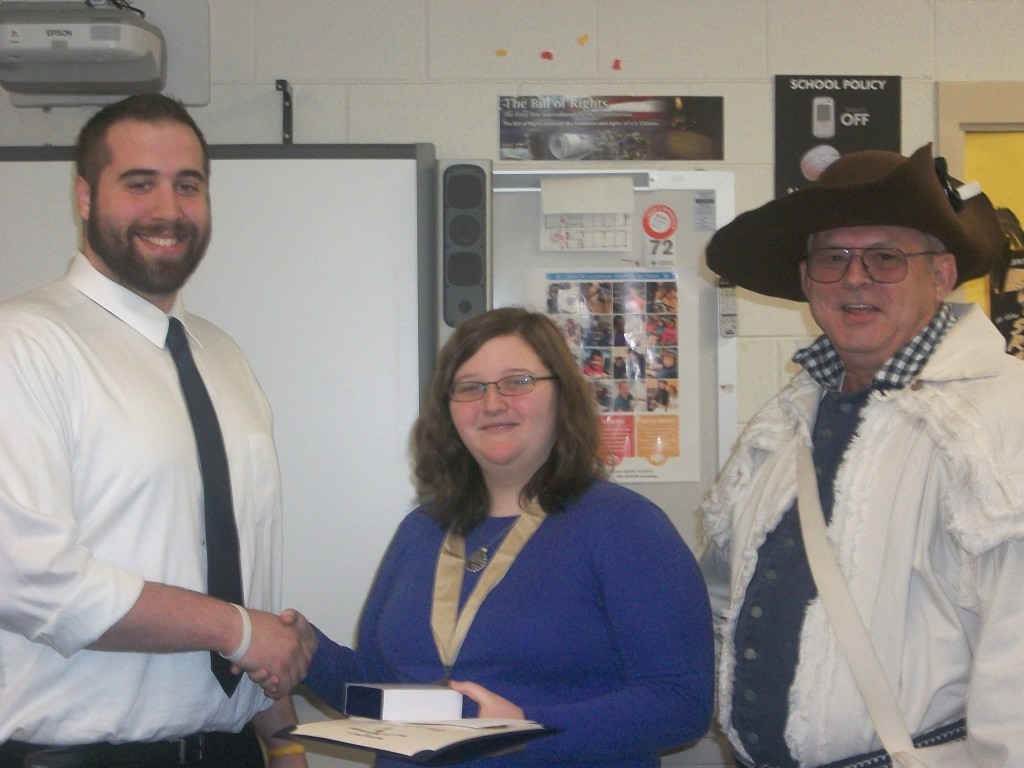 Honors History Teacher Seth Warren congratulates Ellen Burgess 2015 Knight Essay Winner following award by Halifax Resolves Chapter Pres. Ken Wilson