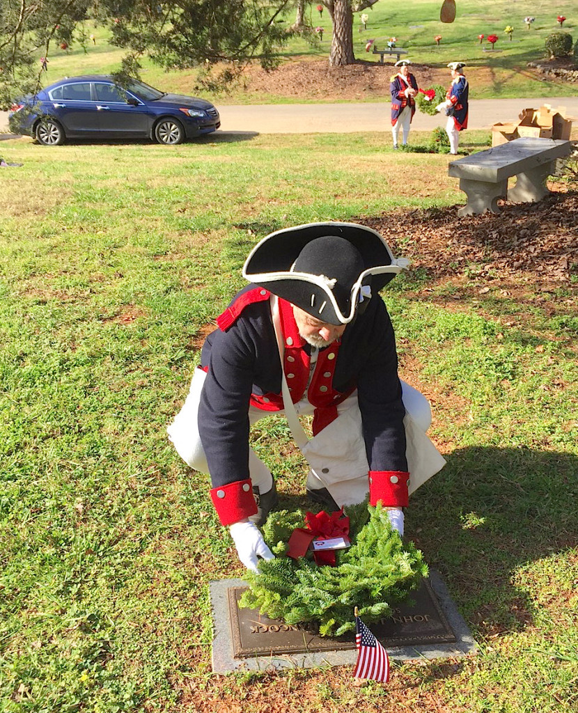 Mecklenburg chapter vice president Ken Luckey lays a wreath for a Veteran on December 12, 2015 at Forest Lawn East Cemetery in Matthews, NC.