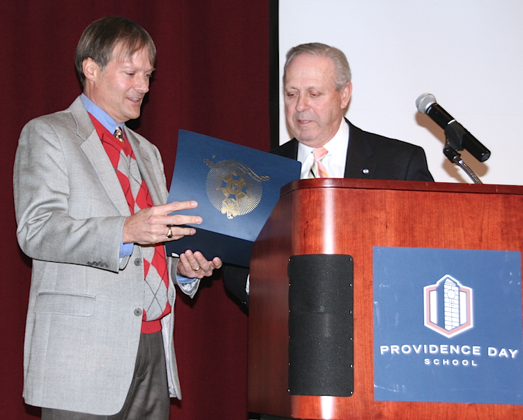 Mecklenburg chapter director Guy Chamberlain presents the SAR American History Teacher Award to Providence Day teacher Edward Dickson on January 11, 2016.