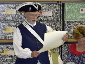 Rolf Maris, NEW Bern Chapter President, reads the Constitution to students.