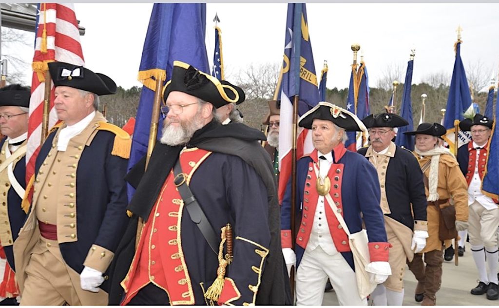 Gen George Washington SAR chapter president George Strunk carries the NC State Flag at the Annual Battle of Cowpens ceremony in Gaffney, SC, on January 18, 2020.